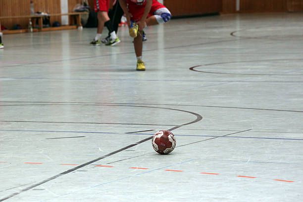 handball in a sports hall stock photo