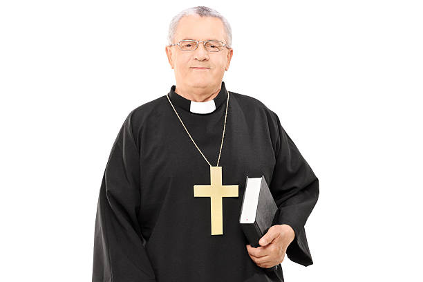 istock Mature priest holding a bible 487688855