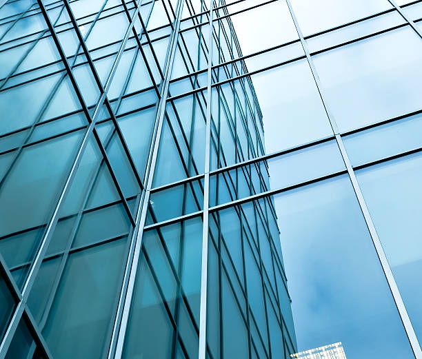istock blue glass wall of skyscraper 487689659