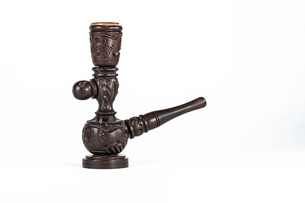 istock pipe tobacco, old and vintage on white background 487689719