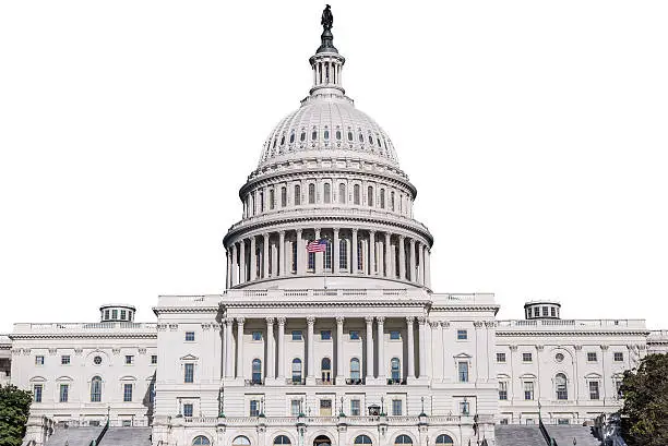 A medium shot of the US Capitol Building isolated on white.
