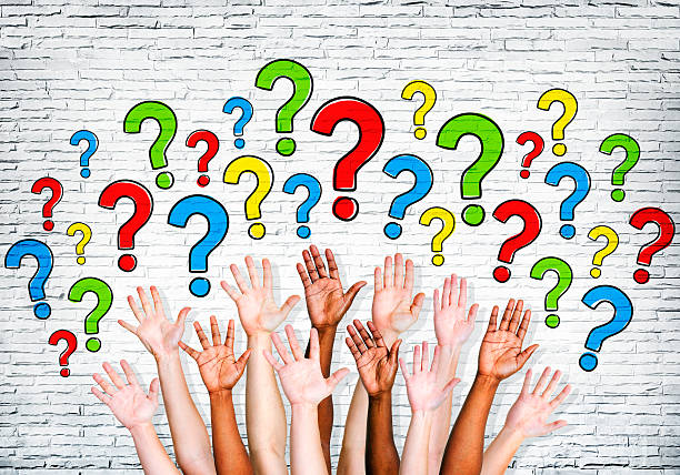 Multi-Ethnic Arms Outstretched To Ask Questions