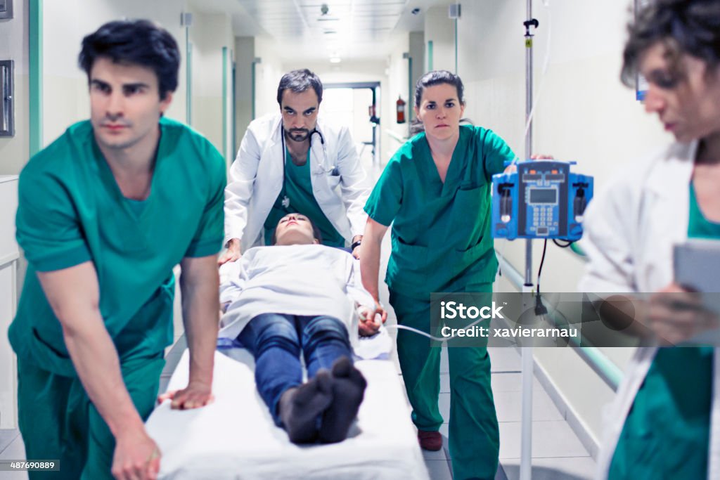Healthy emergency issues Health care team rushing on an emergency operation in the hospital. Hospital Stock Photo
