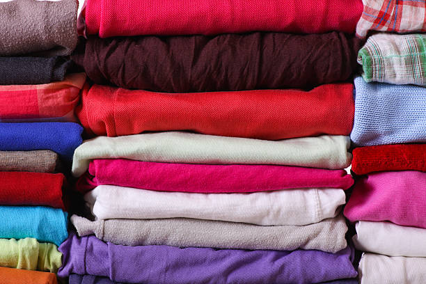 istock Pile of colorful clothes 487691423