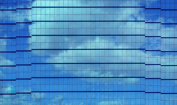 istock Glass Background with Reflection of Clouds and Sky 487691667