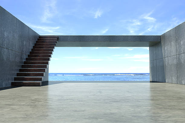 istock Concrete wall with wooden stairs on the beach 487691725