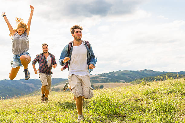 istock Group of friends running free 487691844