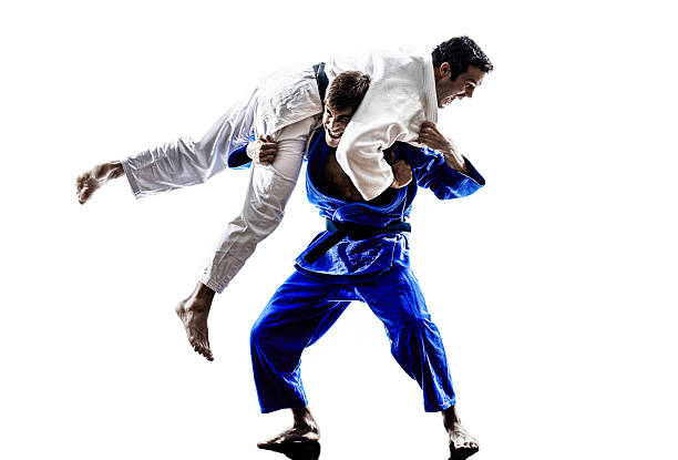istock judokas fighters fighting men silhouettes 487691915