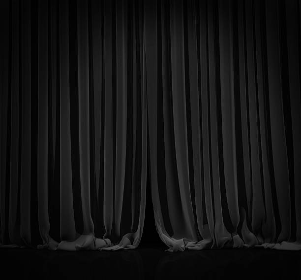 istock Black curtain in theater. 487692148