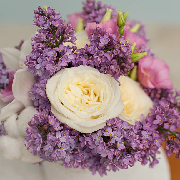 istock flower composition with lilac and roses 487692210