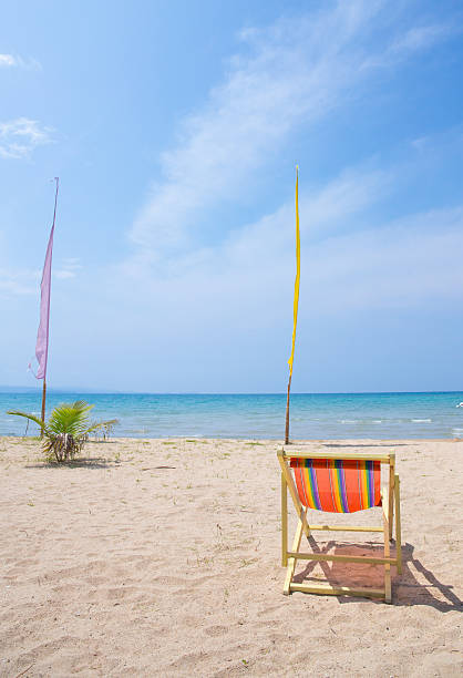 istock Beach chairs on the white sand beach 487693785