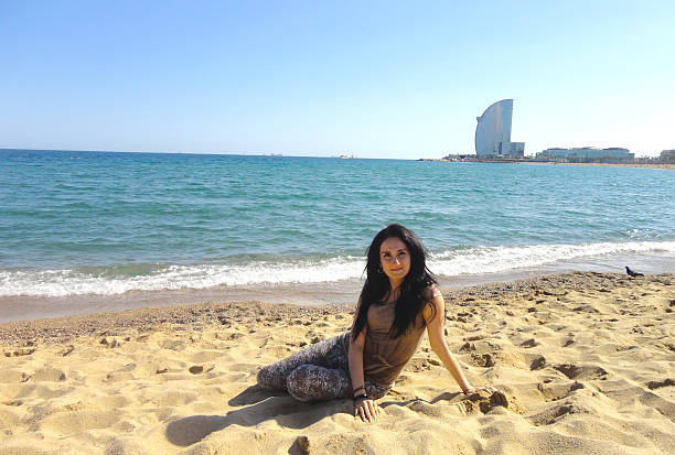 istock Beautiful brunette on Barcelona Beach 487694543