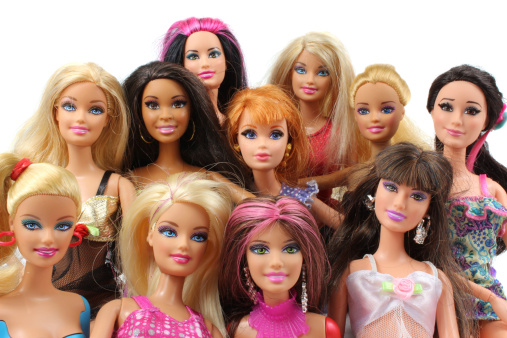 Trowbridge, Wiltshire, UK - April 23, 2014: Photograph of 11 Barbie Dolls from the toy company Matel.