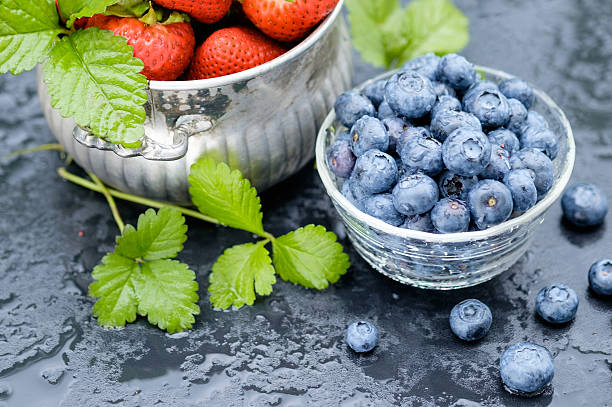 Strawberry and Blueberry on a Wet Table stock photo