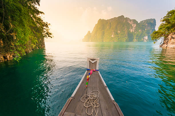 Beautiful mountains lake river sky and natural attractions in Ratchaprapha Dam at Khao Sok National Park, Surat Thani Province, Thailand.