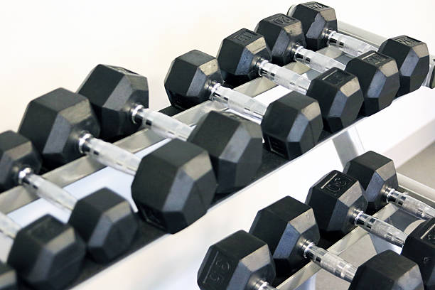 istock Fitness exercise equipment dumbbell weights 487707910