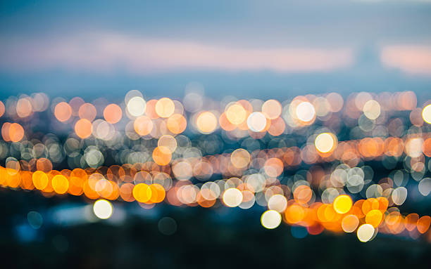 Out of Focus City Lights Out of Focus City Lights flare pants stock pictures, royalty-free photos & images