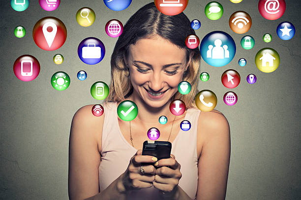 istock happy young woman using texting on smartphone 487718634