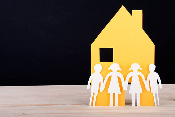 istock Children in front of a House 487722637