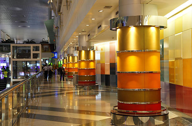 Blurred bright lights and interior architecture, creating a vibrant, abstract background.