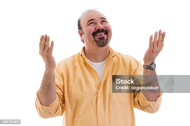 Man Giving Thanks To God For A Successful Outcome Stock Photo - Download Image Now - Gratitude, Men, Looking Up