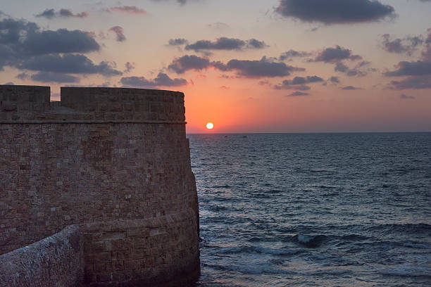 istock Akko Israel's sunset beside the ruins 487726990