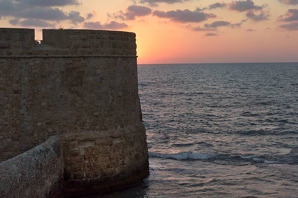 istock Akko Israel's sunset beside the ruins 487726994