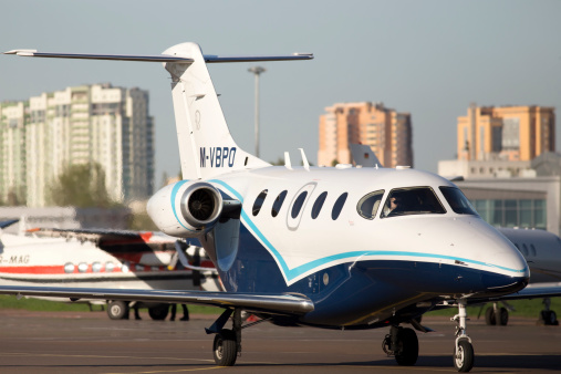 Kiev, Ukraine - April 25, 2014: Raytheon 390 Premier 1A business aircraft running to the Kiev International Airport parking