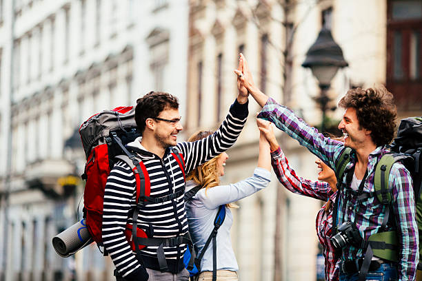 Happy Backpackers meeting in the city.