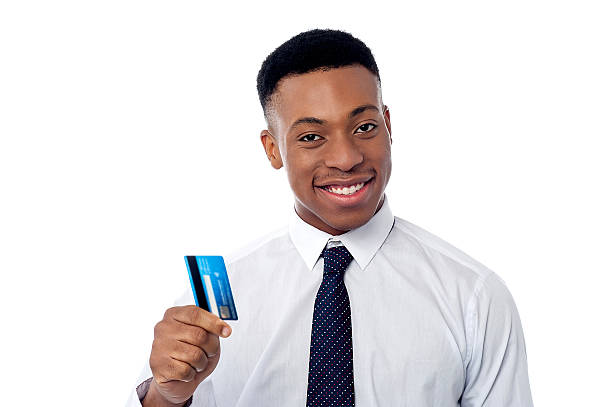 istock Cheerful businessman holding credit card 487728935