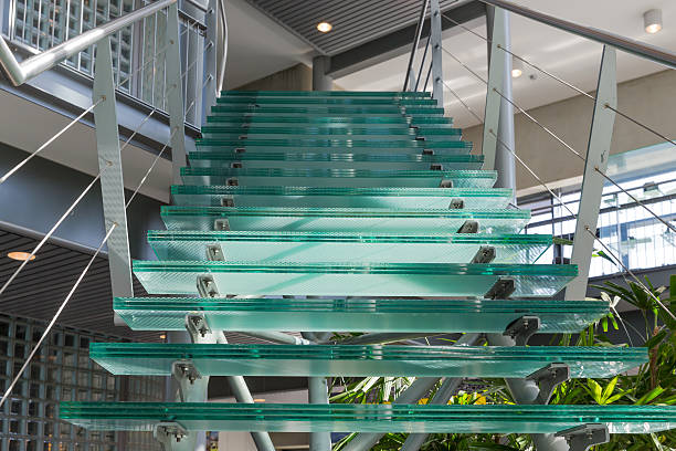 istock Glass stairway in a modern office building 487729145