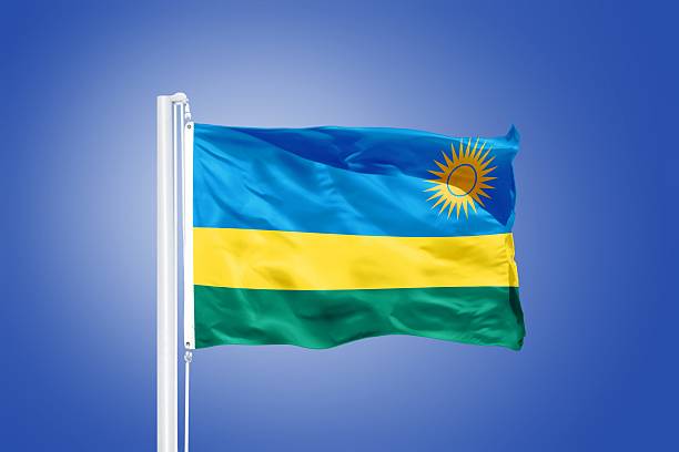 istock Flag of Rwanda flying against a blue sky 487732764
