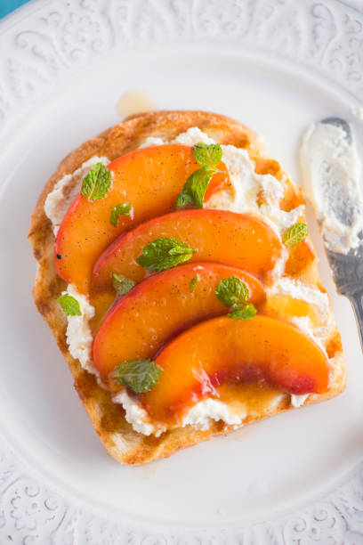 Toast with Goat Creem Cheese and Poached Nectarine