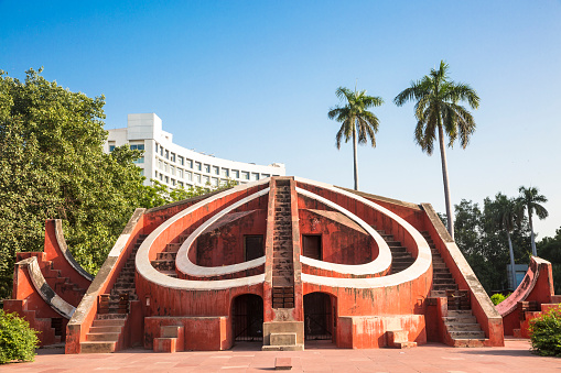 The Jantar Mantar is located in the modern city of New Delhi. It consists of 13 architectural astronomy instruments. The site is one of five built by Maharaja Jai Singh II of Jaipur. Built around 1724, it is a prominent tourist attraction in Delhi.