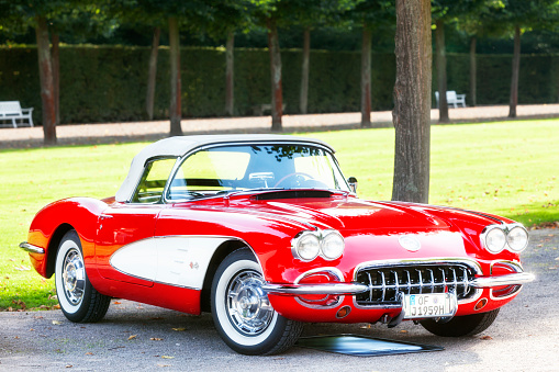 Schwetzingen, Germany - August 29, 2014: A legendary 1958 Chevrolet Corvette C1, red, convertible, sports, classic car in excellent condition at a vintage car meeting. This model was produced from 1958-1961.