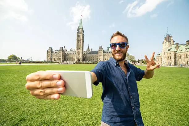 Photo of Student male taking selfie in Ottawa