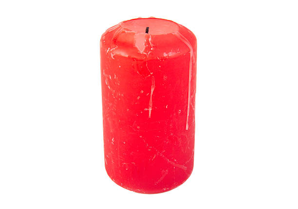 istock Red used candle isolated on a white background 487745144