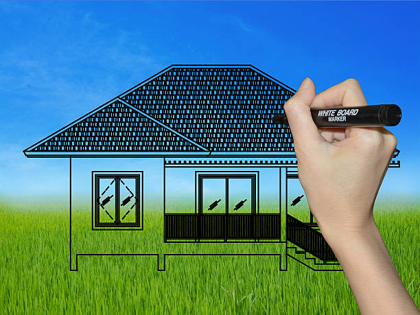 istock Hand drawing a house on a landscape 487745219