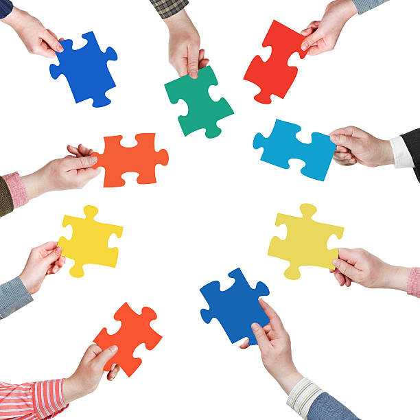 istock set puzzle pieces in people hands in circle 487746267
