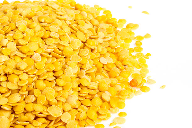 istock Yellow lentils isolated on white background. Macro shot 487747487