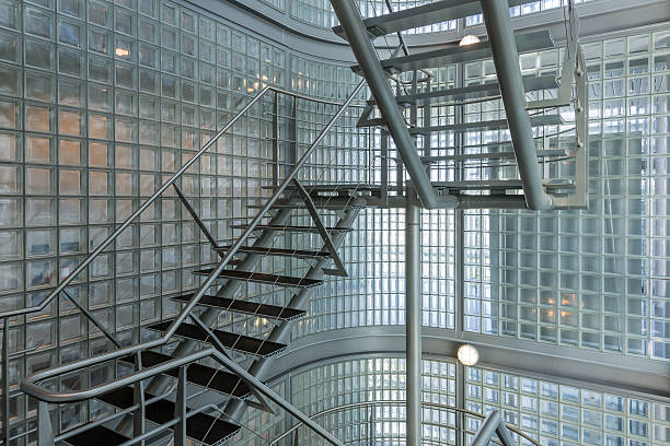 Steel stairway in a modern office building Steel stairway in a modern office building emergency exit photos stock pictures, royalty-free photos & images