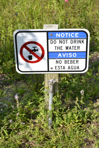 The sign informs the the water is not good for human consumption. 