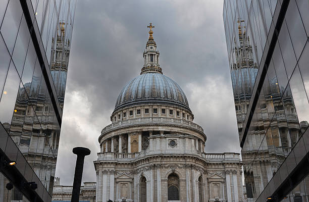 istock St.Paul’s Cathedral reflected on glass office building in London 487748435