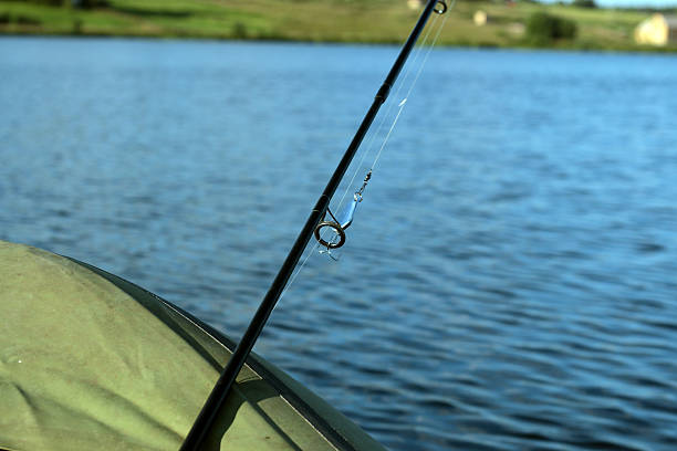 istock landscape water fishing people 487749092