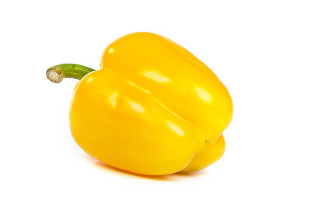 istock yellow bell sweet pepper isolated on white 487751189
