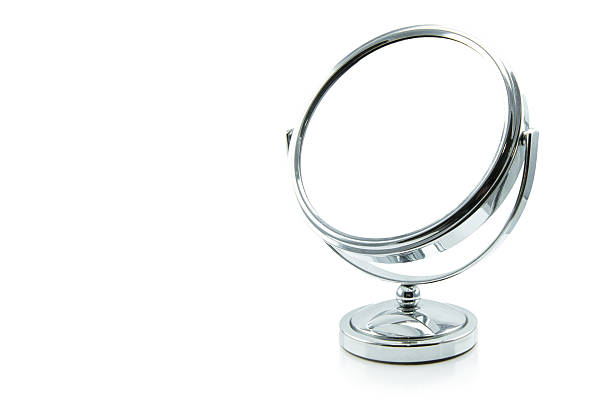 silver makeup mirror isolated on white. silver makeup mirror isolated on white. mirror object stock pictures, royalty-free photos & images