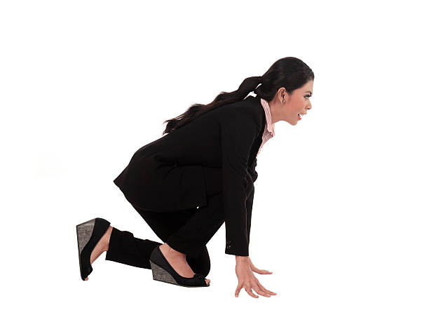 istock Asian business woman running 487752482