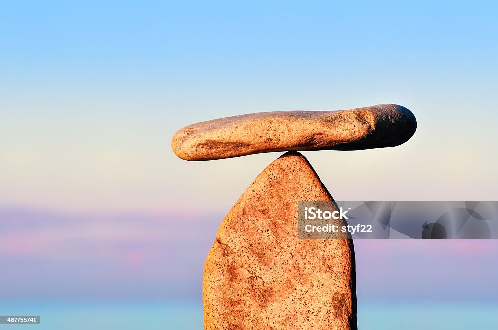 Balance of two stones Balance of two stones each other on the coast 2015 Stock Photo