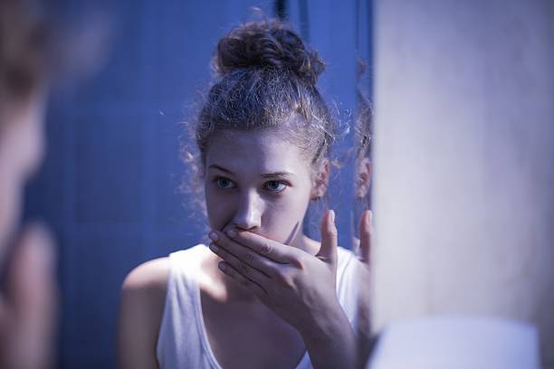 istock Vomiting girl suffering from bulimia 487759058