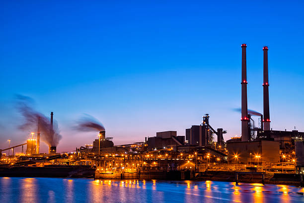 istock Illuminated Industrial Plant on the River at Night,  Amsterdam, Netherlands 487759794